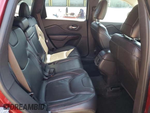 2014 Jeep Cherokee Trailhawk с VIN 1C4PJMBS8EW268056, выставлен на аукционе Copart как лот 54951885 с пробегом 111 678 миль миль и Списание • Salvage title. История ставок и продаж доступна на DreamBid. Изображение 11.