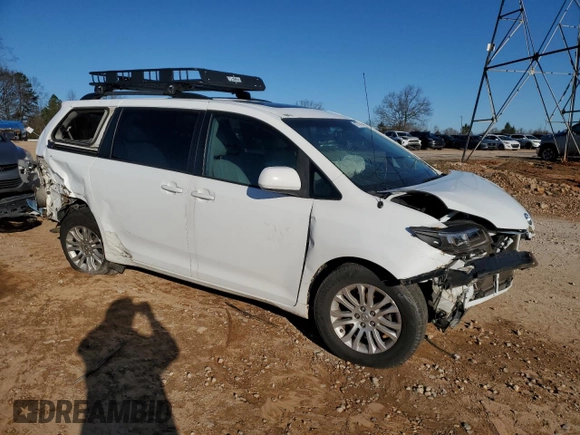 2011 Toyota Sienna XLE AAS с VIN 5TDYK3DC2BS094482, выставлен на аукционе Copart как лот 41777475 с пробегом 183 545 миль миль и Списание • Salvage title. История ставок и продаж доступна на DreamBid. Изображение 4.