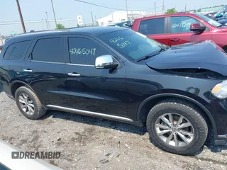 2014 Dodge Durango Limited with VIN 1C4RDJDG5EC532942, listed as a IAAI auction lot 42465047 with 116,617 mi miles and . Bid and sale history available at DreamBid. Image 13.