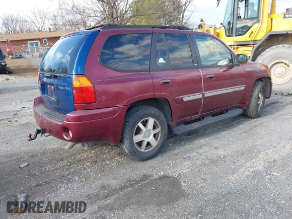 2004 GMC Envoy SLE with VIN 1GKDS13S342287315, listed as a IAAI auction lot 41486715 with 186,129 mi miles. Bid and sale history available at carsss.com. Image 4.