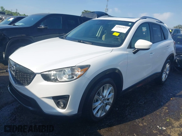 2014 Mazda CX-5 Grand Touring with VIN JM3KE2DY1E0424890, listed as a IAAI auction lot 42052437 with 107,793 mi miles. Bid and sale history available at carsss.com. Image 17.
