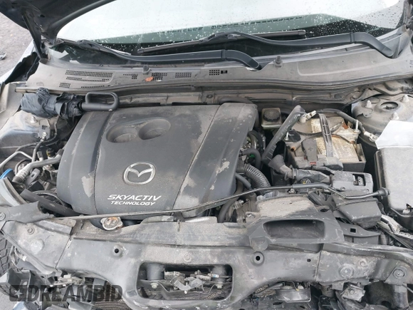 2017 Mazda 3 Touring with VIN 3MZBN1V72HM103660, listed as a IAAI auction lot 41588084 with 95,184 mi miles and . Bid and sale history available at DreamBid. Image 10.