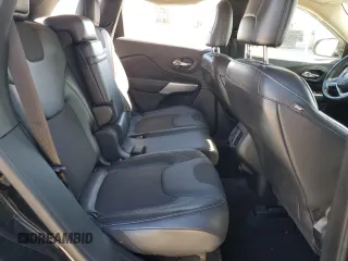 2018 Jeep Cherokee Latitude Plus with VIN 1C4PJLLXXJD557028, listed as a Copart auction lot 76671214 with 105,459 mi miles and Salvage Title. Bid and sale history available at carsss.com. Image 12.