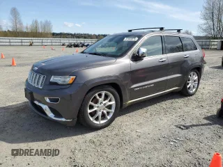2014 Jeep Grand Cherokee Summit with VIN 1C4RJFJM3EC516979, listed as a Copart auction lot 51949975 with 124,737 mi miles and Clean title. Bid and sale history available at DreamBid. Image 1.