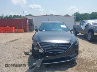 2018 Mazda CX-9 Grand Touring with VIN JM3TCADY7J0217595, listed as a IAAI auction lot 42381331 with 130,604 mi miles and . Bid and sale history available at DreamBid. Image 12.