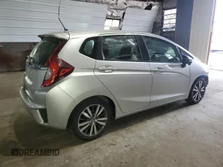 2015 Honda Fit EX-L with VIN 3HGGK5H86FM754172, listed as a Copart auction lot 60870975 with 74,377 mi miles and Salvage title. Bid and sale history available at DreamBid. Image 3.