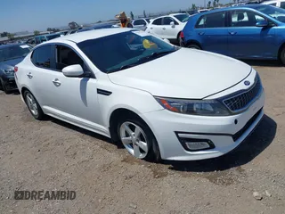 2015 Kia Optima LX z VIN KNAGM4A70F5560048, wystawiony jako IAAI lot #42287733 z przebiegiem 97 073 mil mil oraz . Historia ofert i sprzedaży dostępna na DreamBid. Obrazek 1.
