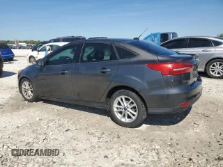 2015 Ford Focus SE with VIN 1FADP3F28FL341666, listed as a Copart auction lot 56338705 with 134,976 mi miles and Clean title. Bid and sale history available at DreamBid. Image 2.