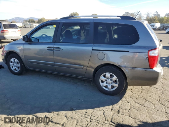 2010 Kia Sedona LX with VIN KNDMG4C39A6351207, listed as a Copart auction lot 76838564 with 210,642 mi miles and Salvage Title. Bid and sale history available at carsss.com. Image 2.