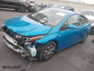 2021 Toyota Prius Prime LE with VIN JTDKAMFP5M3166746, listed as a IAAI auction lot 41412250 with 90,146 mi miles. Bid and sale history available at carsss.com. Image 20.