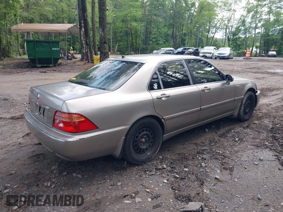 2002 Acura RL with VIN JH4KA96682C009762, listed as a IAAI auction lot 42450219 with 207,765 mi miles and . Bid and sale history available at DreamBid. Image 4.
