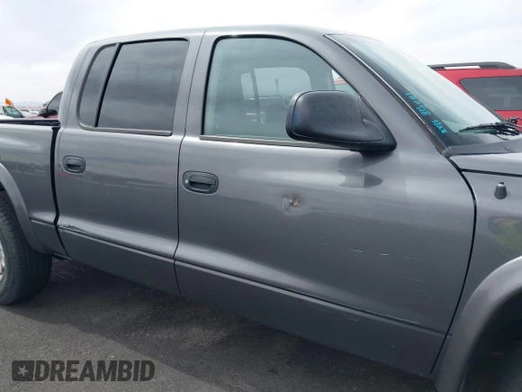 2003 Dodge Dakota SLT with VIN 1D7HL48N93S190381, listed as a IAAI auction lot 41921335 with 75,088 mi miles. Bid and sale history available at carsss.com. Image 12.