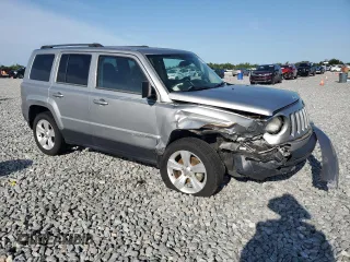 2014 Jeep Patriot Latitude with VIN 1C4NJRFB9ED759908, listed as a Copart auction lot 63874905 with 61,960 mi miles and Salvage title. Bid and sale history available at DreamBid. Image 4.