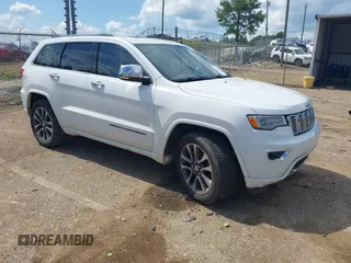 2018 Jeep Grand Cherokee High Altitude z VIN 1C4RJECG5JC260436, wystawiony jako IAAI lot #42572550 z przebiegiem 88 031 mil mil oraz . Historia ofert i sprzedaży dostępna na DreamBid. Obrazek 1.