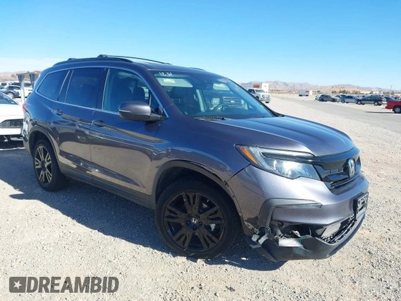 2022 Honda Pilot Special Edition with VIN 5FNYF5H27NB013972, listed as a IAAI auction lot 41219766 with 52,291 mi miles and . Bid and sale history available at carsss.com. Image 1.