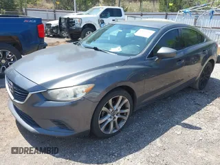 2014 Mazda Mazda6 i Touring with VIN JM1GJ1V6XE1154862, listed as a IAAI auction lot 42052904 with 301,752 mi miles. Bid and sale history available at carsss.com. Image 2.
