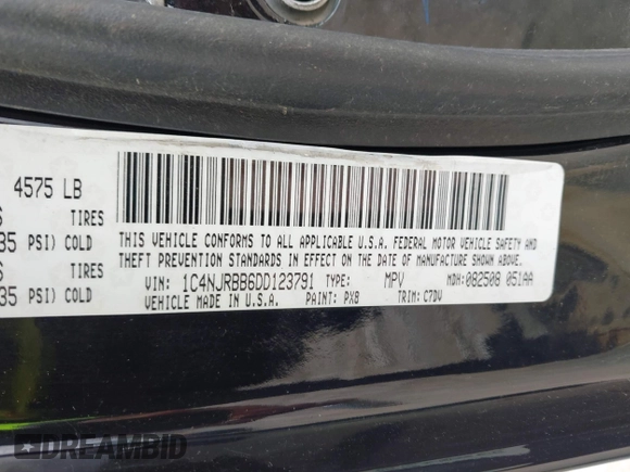 2013 Jeep Patriot Sport with VIN 1C4NJRBB6DD123791, listed as a IAAI auction lot 42202821 with 123,809 mi miles and . Bid and sale history available at DreamBid. Image 9.