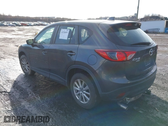 2015 Mazda CX-5 Sport with VIN JM3KE4BY1F0543507, listed as a IAAI auction lot 41530491 with 127,995 mi miles. Bid and sale history available at carsss.com. Image 3.