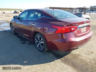 2016 Nissan Maxima 3.5 Platinum with VIN 1N4AA6AP3GC902379, listed as a IAAI auction lot 41454987 with 245,563 mi miles. Bid and sale history available at carsss.com. Image 3.