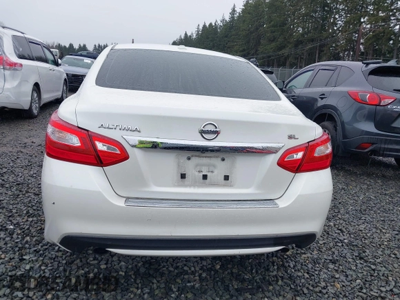 2016 Nissan Altima SV with VIN 1N4AL3AP3GC152359, listed as a IAAI auction lot 41681963 with 70,609 mi miles and . Bid and sale history available at DreamBid. Image 16.