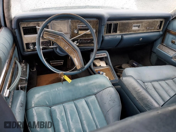 1977 Lincoln Continental with VIN 7W84F813150, listed as a Copart auction lot 45213895 with 91,794 mi miles and Salvage Title. Bid and sale history available at DreamBid. Image 8.