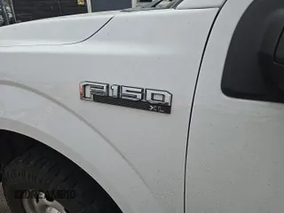 2017 Ford F-150 XL with VIN 1FTEX1E82HKD27618, listed as a IAAI auction lot 42796140 with 124,457 mi miles and . Bid and sale history available at DreamBid. Image 10.