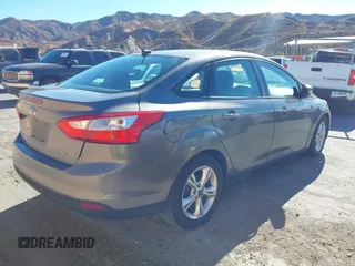 2014 Ford Focus SE with VIN 1FADP3F28EL230114, listed as a IAAI auction lot 41016783 with 66,060 mi miles. Bid and sale history available at carsss.com. Image 4.