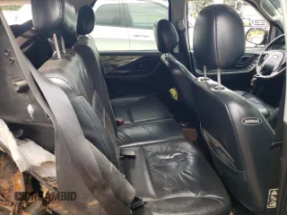 2004 Ford Escape Limited with VIN 1FMCU94144KA37129, listed as a Copart auction lot 64375714 with 181,393 mi miles and Salvage Title. Bid and sale history available at carsss.com. Image 10.