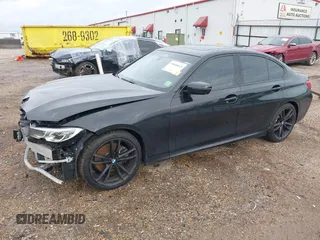 2019 BMW 3 Series 330i with VIN WBA5R1C51KAE82094, listed as a IAAI auction lot 39040815 with 66,344 mi miles and . Bid and sale history available at DreamBid. Image 2.