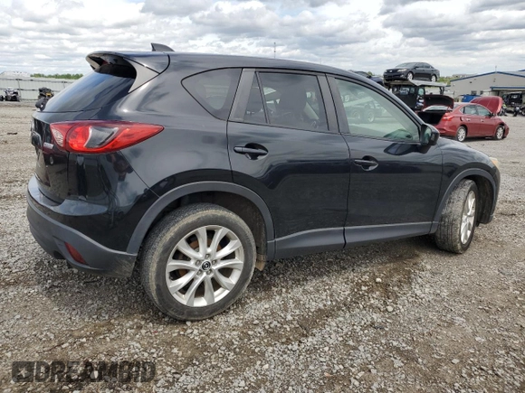 2014 Mazda CX-5 Grand Touring with VIN JM3KE4DY3E0304908, listed as a Copart auction lot 53873655 with 144,382 mi miles and Salvage Title. Bid and sale history available at DreamBid. Image 3.