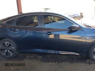 2018 Honda Civic EX-L z VIN JHMFC1F8XJX033602, wystawiony jako IAAI lot #42161015 z przebiegiem 99 597 mil mil oraz . Historia ofert i sprzedaży dostępna na DreamBid. Obrazek 13.