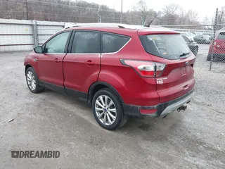 2017 Ford Escape Titanium with VIN 1FMCU9J95HUA48807, listed as a IAAI auction lot 41522636 with 218,342 mi miles. Bid and sale history available at carsss.com. Image 3.