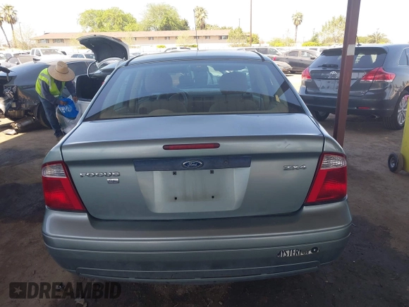 2005 Ford Focus S with VIN 1FAFP34N05W276945, listed as a IAAI auction lot 41889586 with 253,219 mi miles. Bid and sale history available at carsss.com. Image 16.