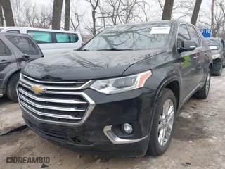 2018 Chevrolet Traverse High Country with VIN 1GNEVKKW0JJ101899, listed as a IAAI auction lot 41398396 with 107,055 mi miles. Bid and sale history available at carsss.com. Image 6.