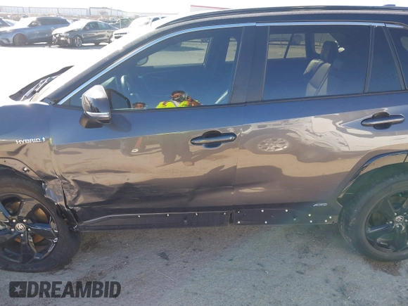 2021 Toyota RAV4 Hybrid XSE with VIN 4T3E6RFV5MU057078, listed as a IAAI auction lot 41718381 with 65,797 mi miles. Bid and sale history available at carsss.com. Image 6.