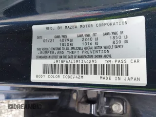 2021 Mazda 3 S with VIN JM1BPAAL5M1344295, listed as a IAAI auction lot 41499549 with 35,513 mi miles and . Bid and sale history available at DreamBid. Image 9.