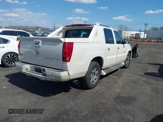 2004 Cadillac Escalade EXT z VIN 3GYEK62N24G294489, wystawiony jako IAAI lot #41887062 z przebiegiem 159 000 mil mil oraz . Historia ofert i sprzedaży dostępna na DreamBid. Obrazek 4.