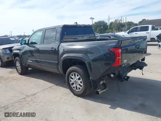 2024 Toyota Tacoma 4WD SR5 with VIN 3TMLB5JN5RM052698, listed as a IAAI auction lot 41427313 with 9,624 mi miles. Bid and sale history available at carsss.com. Image 14.