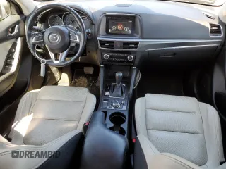 2016 Mazda CX-5 Grand Touring with VIN JM3KE4DY0G0727366, listed as a Copart auction lot 51682115 with 114,462 mi miles and Salvage Title. Bid and sale history available at carsss.com. Image 8.