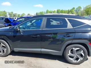 2022 Hyundai Tucson SEL z VIN 5NMJF3AE6NH018945, wystawiony jako IAAI lot #42050780 z przebiegiem 113 680 mil mil oraz . Historia ofert i sprzedaży dostępna na DreamBid. Obrazek 14.