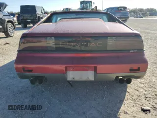 1987 Pontiac Fiero GT z VIN 1G2PG1195HP233666, wystawiony jako Copart lot #78981714 z przebiegiem Nie podano mil oraz Szkody całkowita. Historia ofert i sprzedaży dostępna na DreamBid. Obrazek 6.