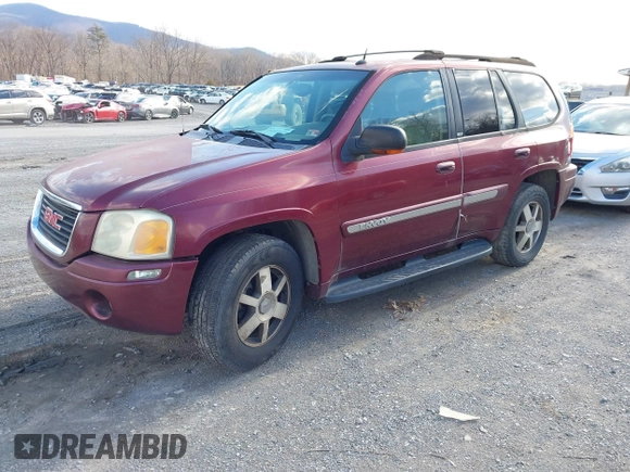 2004 GMC Envoy SLE with VIN 1GKDS13S342287315, listed as a IAAI auction lot 41486715 with 186,129 mi miles. Bid and sale history available at carsss.com. Image 2.