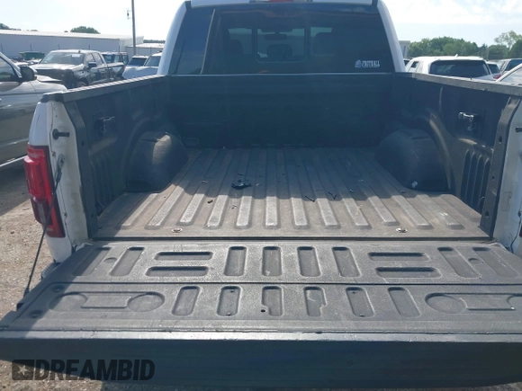 2015 Ford F-150 XLT with VIN 1FTEW1EG0FKD35742, listed as a IAAI auction lot 42563552 with 179,814 mi miles and . Bid and sale history available at DreamBid. Image 18.