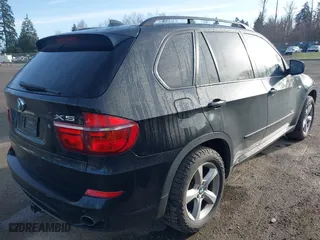 2011 BMW X5 35i with VIN 5UXZV4C57BL408907, listed as a IAAI auction lot 41807017 with 162,710 mi miles. Bid and sale history available at carsss.com. Image 4.