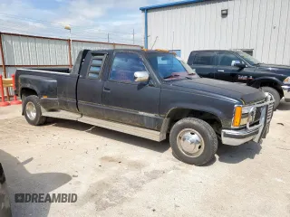 1992 GMC Sierra 1500 with VIN 2GTHC39NXN1556192, listed as a Copart auction lot 55469485 with 128,938 mi miles and Clean Title. Bid and sale history available at DreamBid. Image 4.