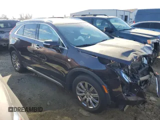 2021 Cadillac XT4 AWD Premium Luxury with VIN 1GYFZDR46MF040495, listed as a Copart auction lot 84465044 with Not Provided miles and Salvage Title. Bid and sale history available at carsss.com. Image 4.