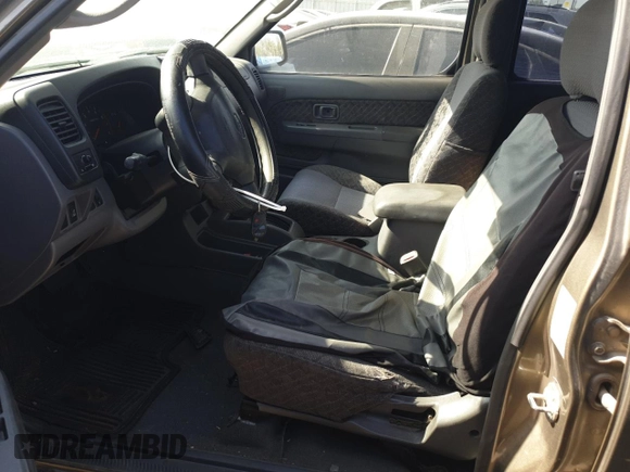 2001 Nissan Xterra XE with VIN 5N1ED28T91C541628, listed as a Copart auction lot 57712125 with 104,738 mi miles and Salvage title. Bid and sale history available at DreamBid. Image 7.