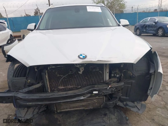 2013 BMW X1 28i with VIN WBAVM1C53DVW45884, listed as a IAAI auction lot 41750396 with 143,287 mi miles. Bid and sale history available at carsss.com. Image 13.