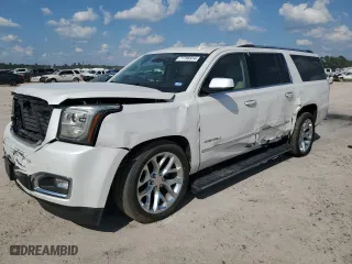 2020 GMC Yukon XL Denali with VIN 1GKS1HKJ1LR303285, listed as a Copart auction lot 71786914 with 132,278 mi miles and Salvage Title. Bid and sale history available at carsss.com. Image 1.