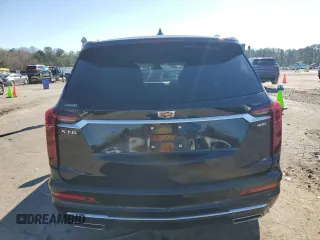 2021 Cadillac XT6 Premium Luxury z VIN 1GYKPCRS8MZ108761, wystawiony jako Copart lot #87185084 z przebiegiem 39 701 mil mil oraz Szkody całkowita. Historia ofert i sprzedaży dostępna na DreamBid. Obrazek 6.